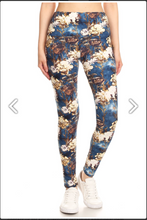 One Size Abstract Floral Print Leggings On A Teal Blue Background